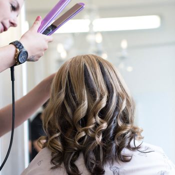 Olivias stylist makes finishing touches