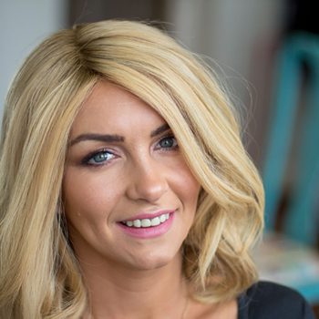 Smiling Client With Alopecia And Blonde Enhancer System Fitted