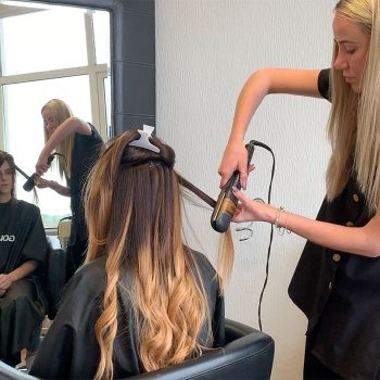 Jo, 40, is thrilled has her long brown enhancer system styled at our Manchester salon