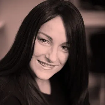 Client, Jo, Smiling with long dark hair again