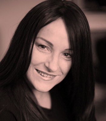 Client, Jo, Smiling with long dark hair again