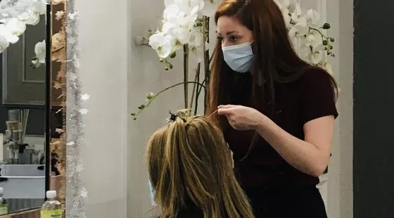 Dionne at work at Hair Solved Glasgow