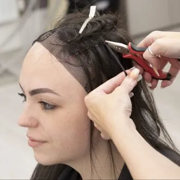 Sophie having her system fitted to restore female hair loss from alopecia.